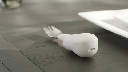 image of the liftware steady on a table with the Spork attachment