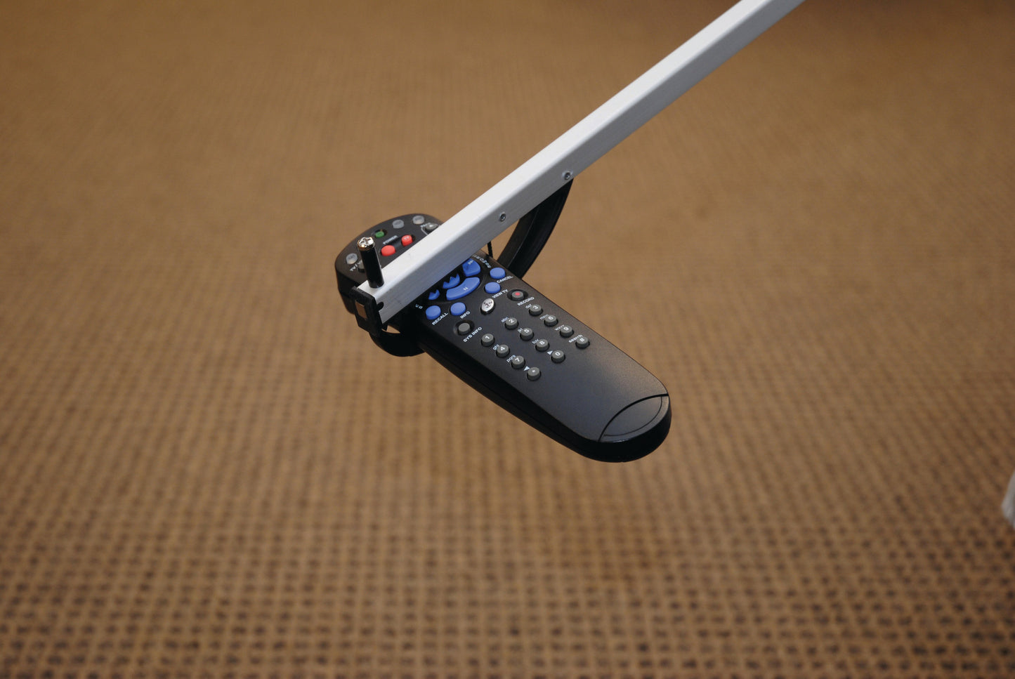 Reach-N-Grip picking up a TV remote control