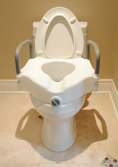 Raised Toilet Seat with Handles attached to a toilet