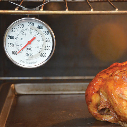 DT160 Dial Oven Thermometer hanging in the oven with a chicken