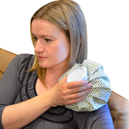 person using an ice bag on their shoulder