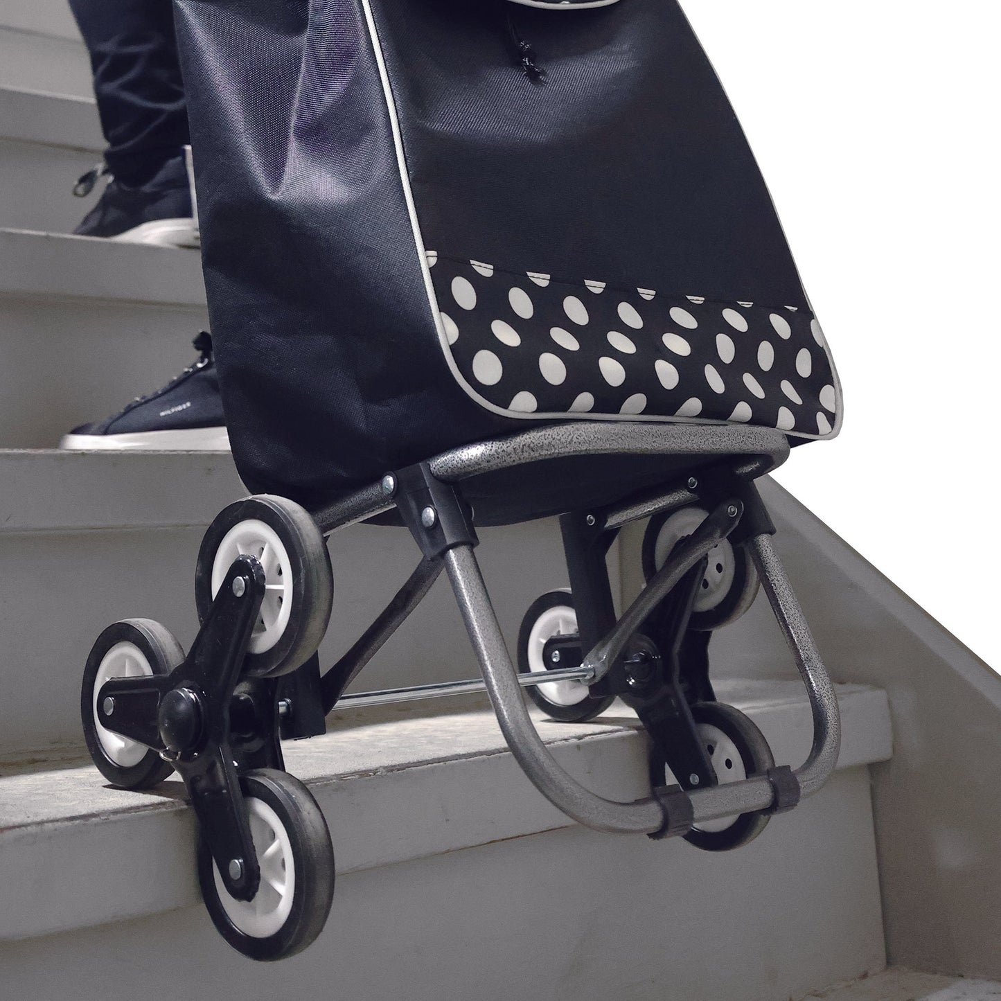 shopping cart being pulled up the stairs