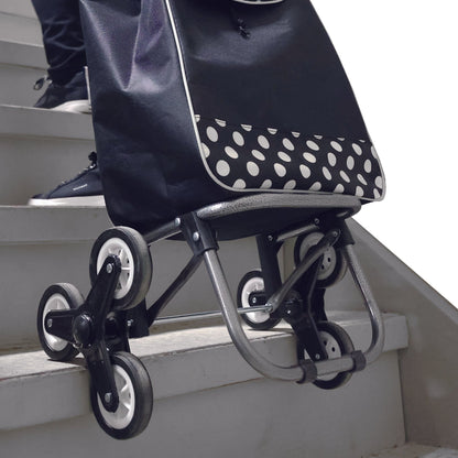 shopping cart being pulled up the stairs