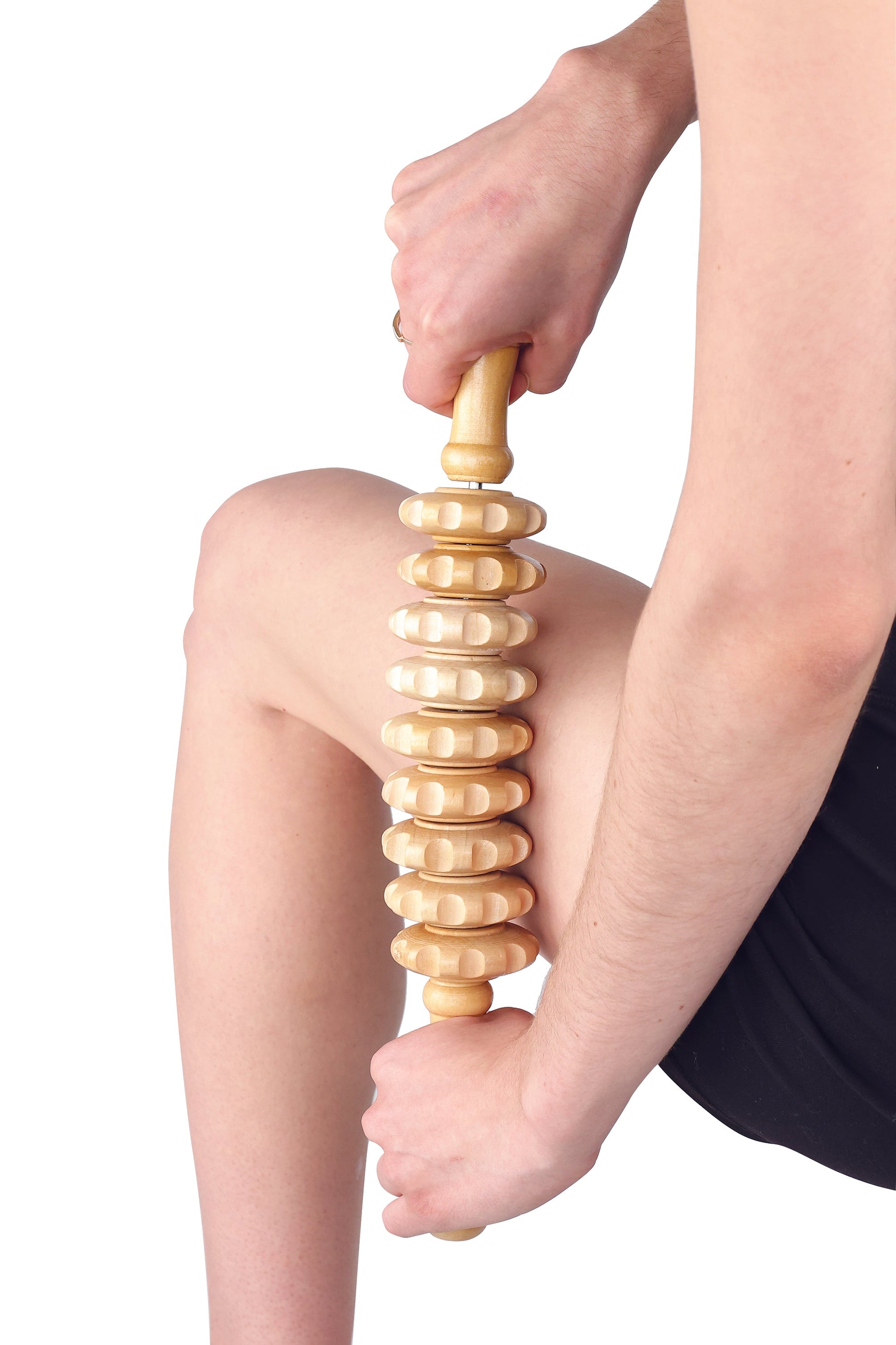 massage roller pin used on a persons thigh