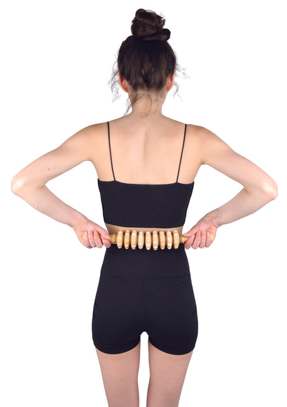 massage roller pin being used on a lower back