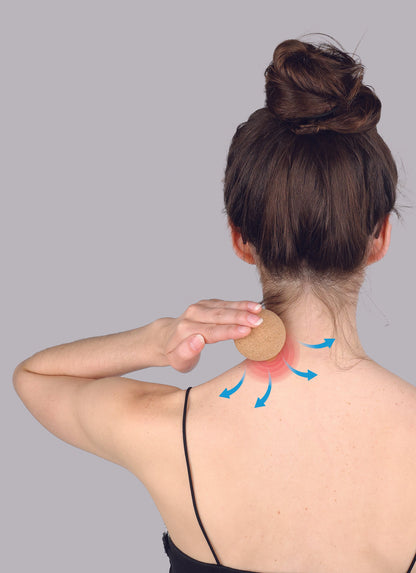 back view of a person using the cork ball on the back of their neck