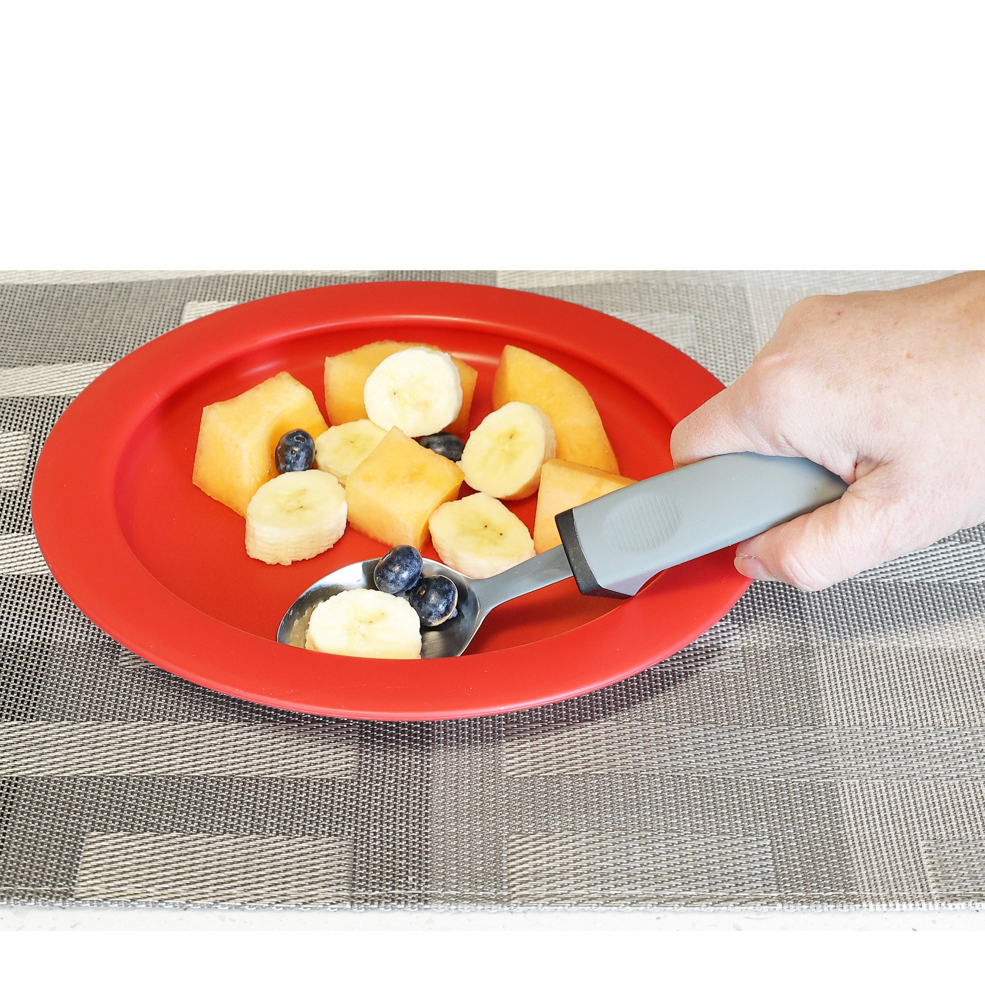 fruits on a red inner lip plate