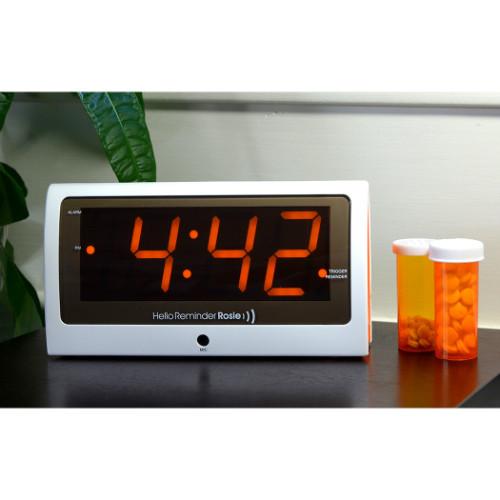 LG604 Reminder Rosie Personalized Voice Alarm Clock on a side table