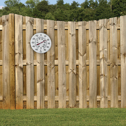 TR605 12" / 30 cm Dial Weather Thermometer on fence