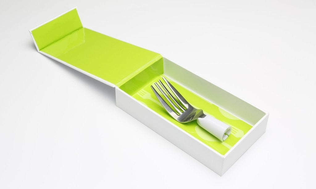 Liftware fork attachment in its packaging